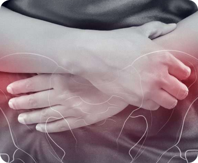 Person experiencing abdominal pain, holding their stomach in discomfort, in New York City