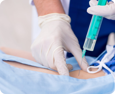 Close-up of a healthcare professional administering a spinal injection treatment to a patient, with a focus on the needle and injection site in New York City
