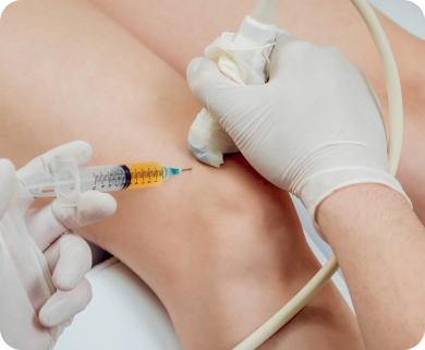 Healthcare professional performing an ultrasound-guided knee joint injection for pain relief in New York City