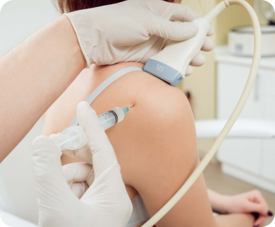 Healthcare professional performing an ultrasound-guided shoulder injection to a patient in New York City for pain relief