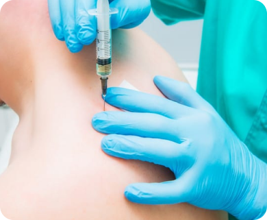Close-up of a healthcare professional administering a spinal injection for shoulder pain relief in New York City